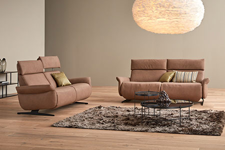 Interior highlight - comfort sofa with wall-free relax function and height-adjustable headboard